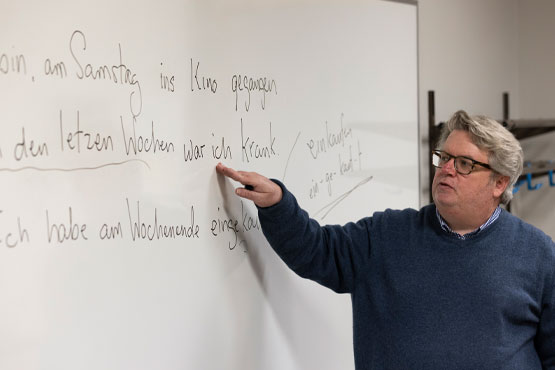 Professor teaching a foreign language class at the University of Michigan-Flint.