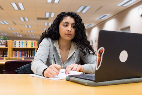Student working on a laptop.