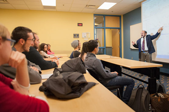 UM-Flint School of Management faculty member teaching an Entrepreneurship & Innovation Management class.